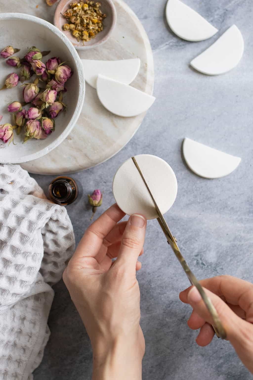 Cut sponges to make puffy eye mask