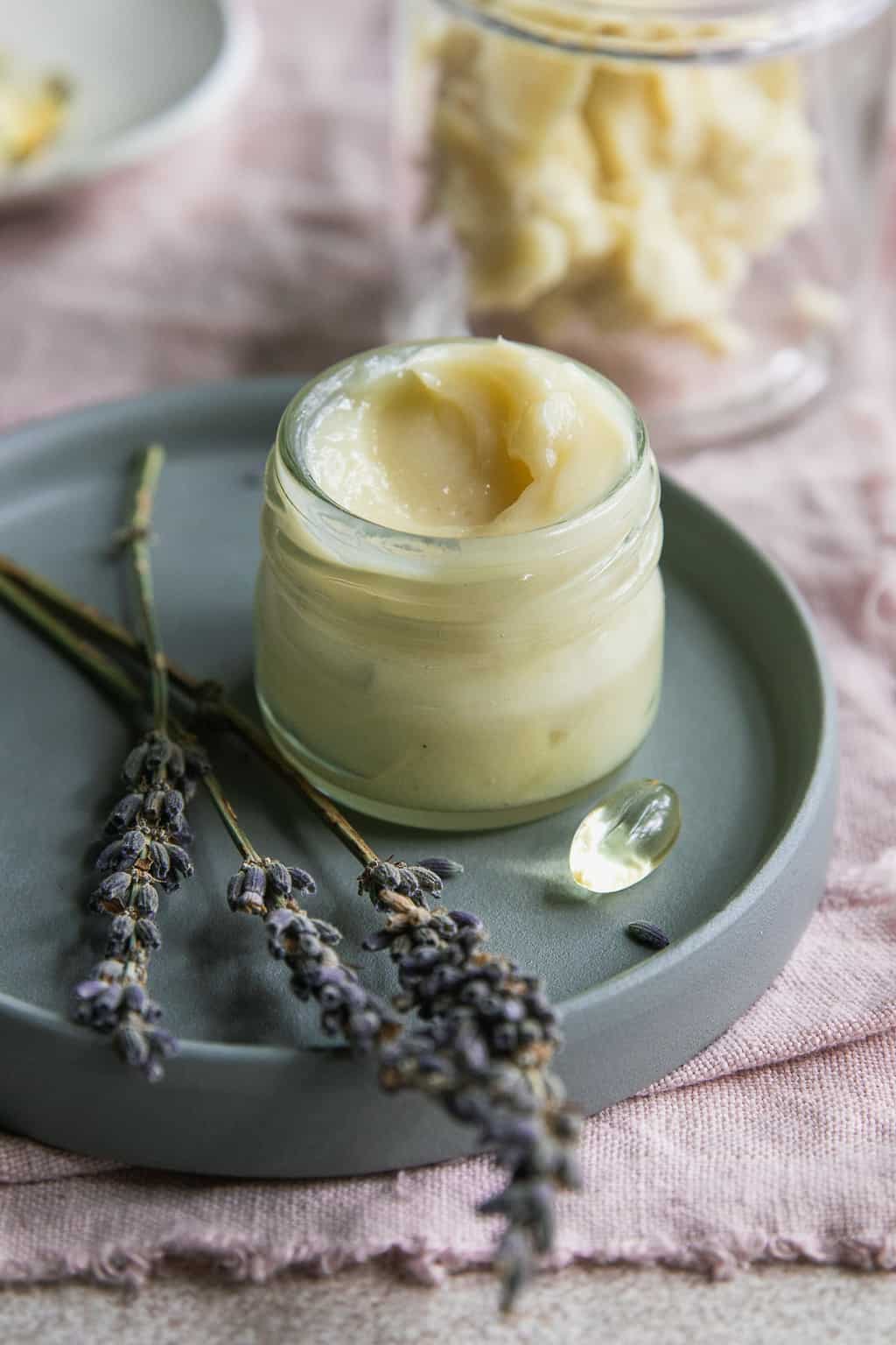 Coconut oil, shea butter, apricot kernel oil and essential oils combine in this vitamin A- and E-rich homemade eye wrinkle cream recipe.